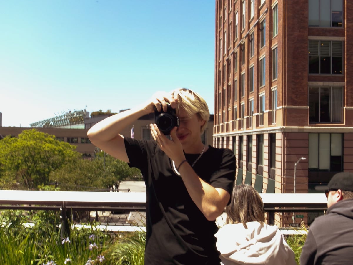 A photo of me holding a camera